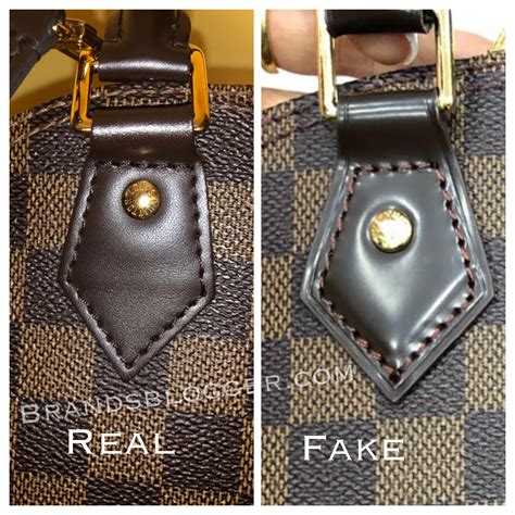 lv alma original vs fake|real louis vuitton alma bag.